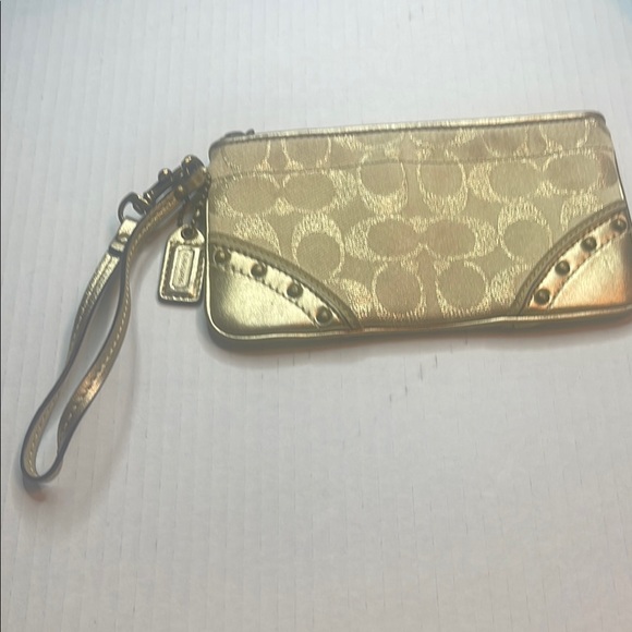 Coach Handbags - Gold Wristlet with Stud Accents
